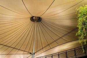 Canvas roof and large structure Stretched between buildings photo