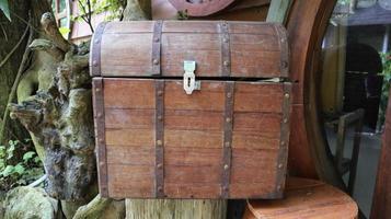 An old brown treasure chest can be used as a decoration. photo