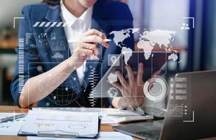 Intelligence and business analytics with dashboard concept.Website designer working in come digital tablet computer laptop.and smart phone. photo