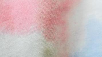 white cloth texture patterned red and blue as background photo