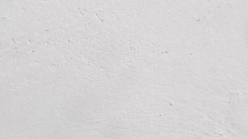 texture of concrete wall with white paint as background photo