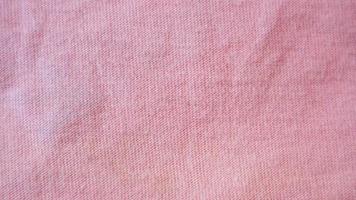 pink cloth texture as background photo