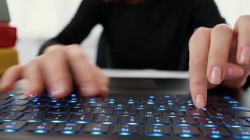 Woman hands typing on laptop, office work video