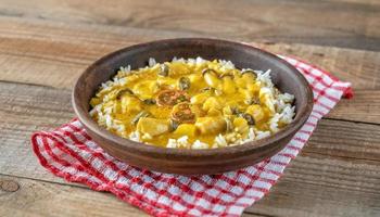 Bowl of yellow curry photo