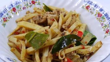 Close Up Thai street food ,Stir-fried spicy bamboo shoots with white background video