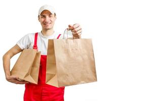 paper containers for takeaway food. Delivery man is carrying photo