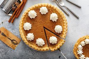 Traditional sweet potato or pumpkin pie, fall desssert photo