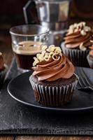 Dark chocolate coffee cupcakes with whipped coffee ganache frosting photo