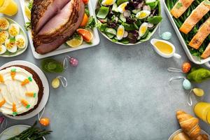 Easter brunch with spiral cut ham and roasted salmon photo