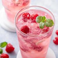 Spring or summer cocktail with raspberry and mint photo