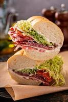 Italian antipasto sandwich with salami and provolone photo