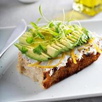 Avocado toast on sour dough bread photo