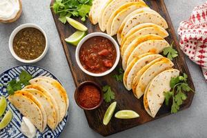 Baked tacos with pulled chicken and cheese photo