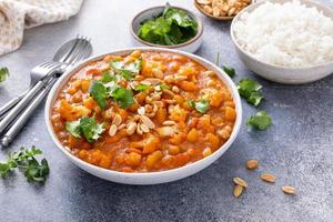 Vegan curry with cauliflower, chickpeas and butternut squash photo