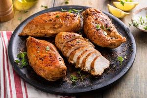 Roasted or seared chicken breast with herbs photo