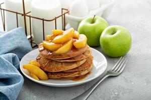 Pancakes with apple caramel topping photo