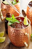 Traditional Moscow Mule in classic copper mugs photo