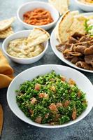 Parsley tabbouleh with tomato and cous cous photo