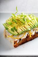 Avocado toast on sour dough bread photo