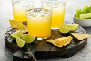 Margaritas served in salt rimmed glasses photo