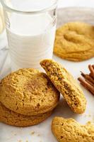 Pumpkin snickerdoodle cookies with cinnamon and milk photo