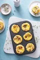 Bacon and cheddar egg muffins for breakfast photo