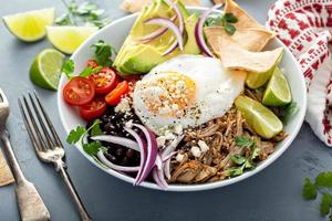 Breakfast burrito bowl with pork carnitas and rice photo