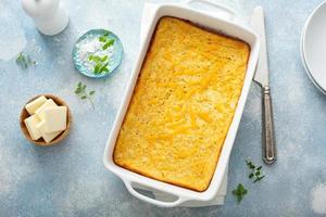 Cheesy cornbread freshly baked in a pan photo