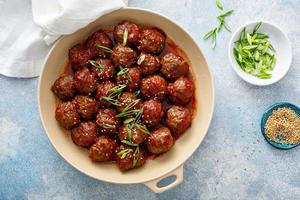Asian meatballs with sweet and sour sauce photo