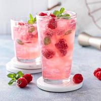 Spring or summer cocktail with raspberry and mint photo