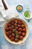 Asian meatballs with sweet and sour sauce photo