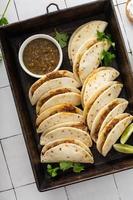 Baked tacos with pulled chicken and cheese photo