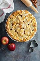 Apple pie topped with hearts photo