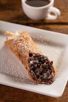 Traditional italian desserts cannoli on the plate photo