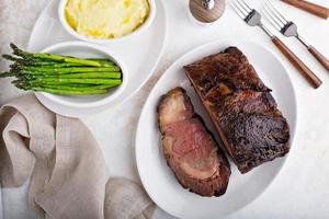 Sunday roast beef sliced on a plate photo