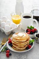 Fluffy buttermilk pancakes with syrup photo