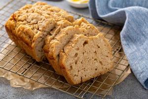 Beer bread on a cooling rack sliced and ready to eat photo