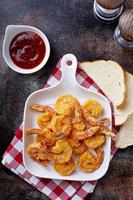 Southern fried shrimp with hot sauce photo