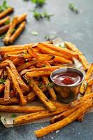 Sweet potato fries with sauces photo