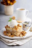 Caramel apple bread pudding with ice cream photo