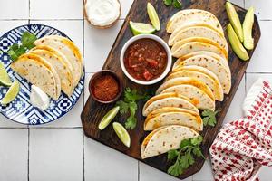 Baked tacos with pulled chicken and cheese photo