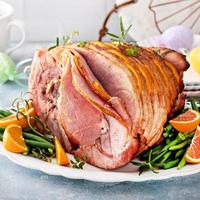 Traditional Easter ham with orange honey glaze photo