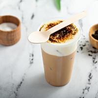 Creme bruleed iced coffee or tea with milk foam topping
