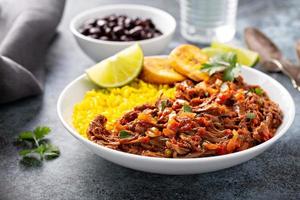 Ropa vieja, flank steak dish with rice photo