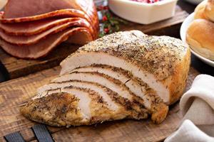 Sliced turkey on Thanksgiving or Christmas table photo
