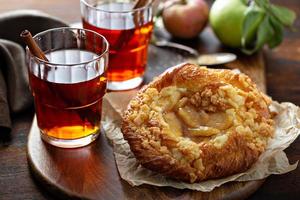 Apple danish pastry with cinnamon tea photo