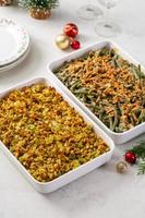 Christmas dinner side dishes including greean beans casserole and stuffing photo