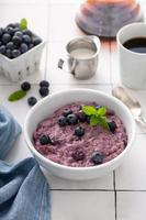 Blueberry oatmeal for breakfast photo