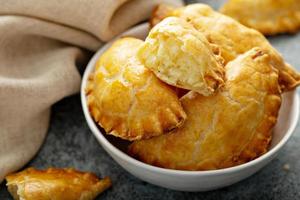 Hand pies with potato filling photo