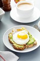 Avocado toast with fried egg photo